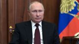 Путин поздравил россиян с Днем защитника Отечества