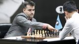 Гроссмейстер выронил в Астане пешку: счëт в матче за шахматную корону сравнялся
