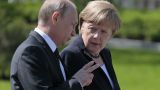 Путин и Меркель обсудили обвинения Запада в адрес Дамаска в химатаке