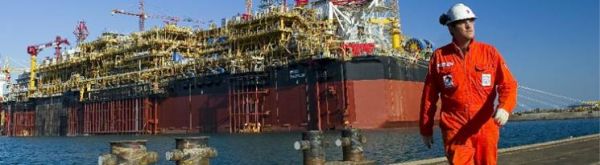 Total из-за низких цен на нефть снижает инвестиции и сдвигает сроки проектов